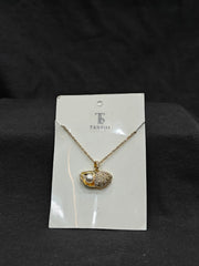 Seashell with pearl necklace