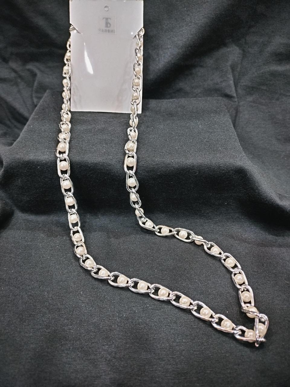 Elegance Entwined: A Fusion of Pearls and Silver