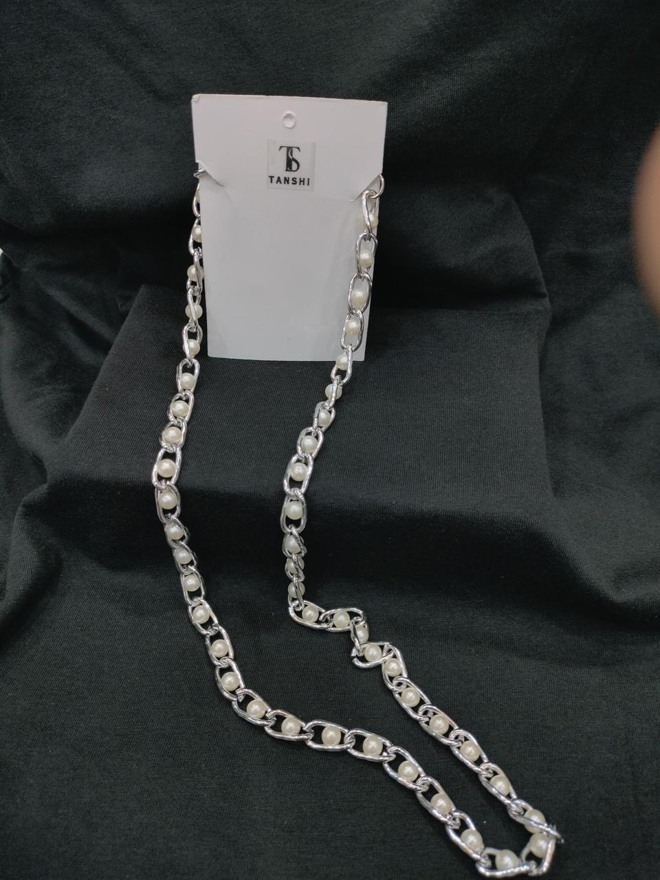 Elegance Entwined: A Fusion of Pearls and Silver