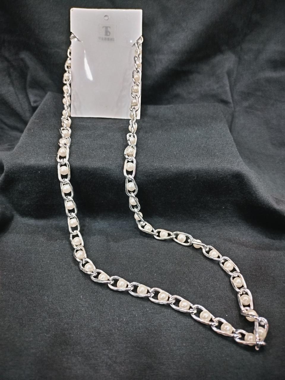 Elegance Entwined: A Fusion of Pearls and Silver