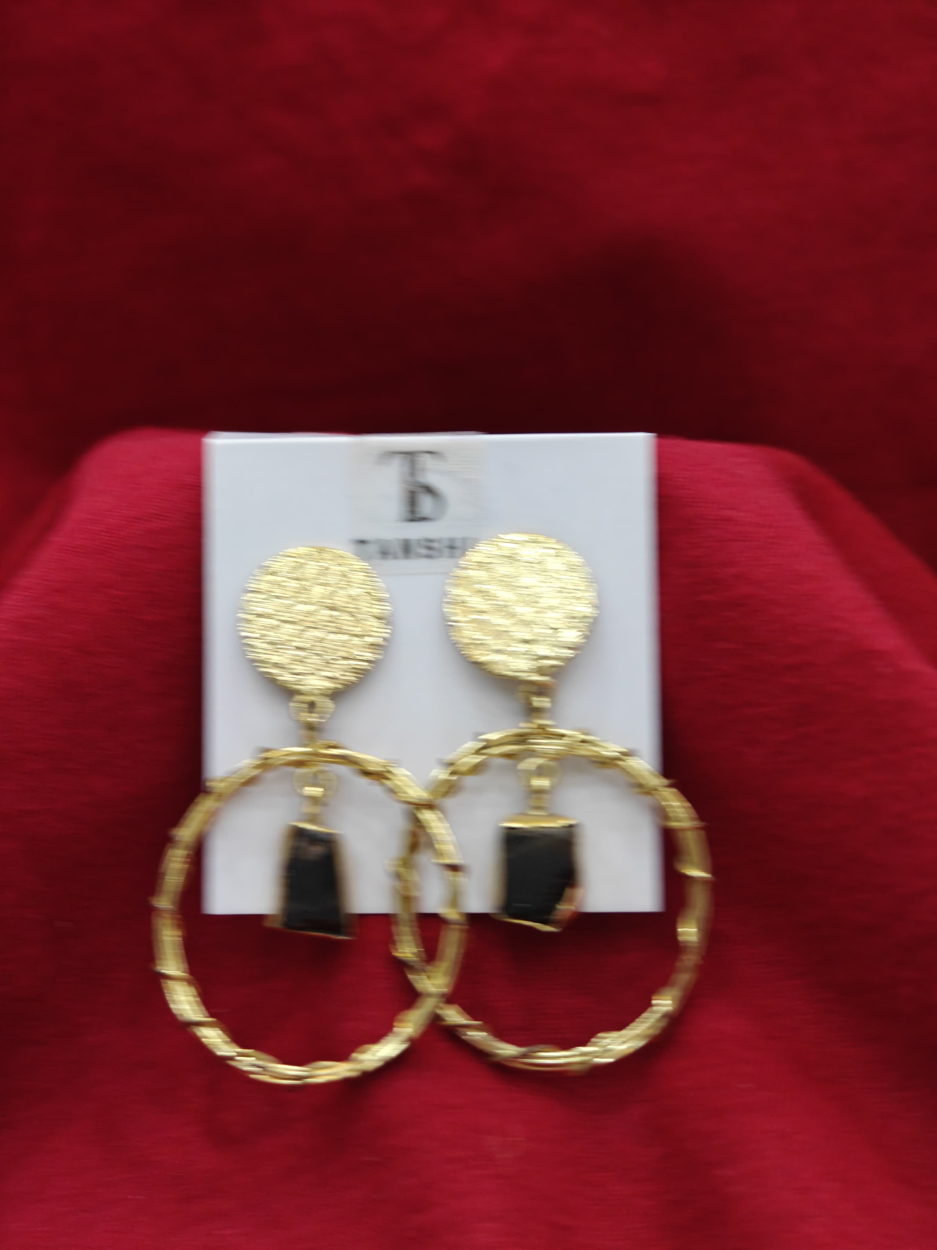 Elegant Textured Gold Hoop Earrings with Black Stone Accent